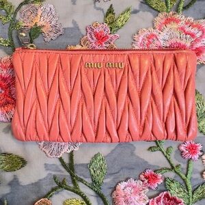 MIU MIU Clutch in Peach Pink 
 Nappa Matelassé Leather Mini Wallet